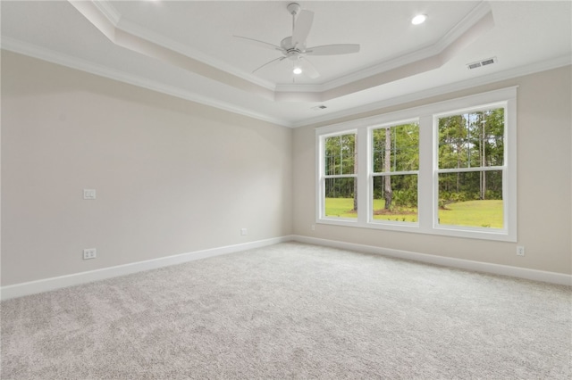 154 Ossabaw Way, Waverly, GA 31565 - unfurnished room with a tray ceiling, ornamental molding, light carpet, a ceiling fan, and recessed lighting
