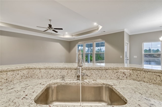 154 Ossabaw Way, Waverly, GA 31565 - kitchen view of a sink, ornamental molding, ceiling fan, light stone counters, and recessed lighting