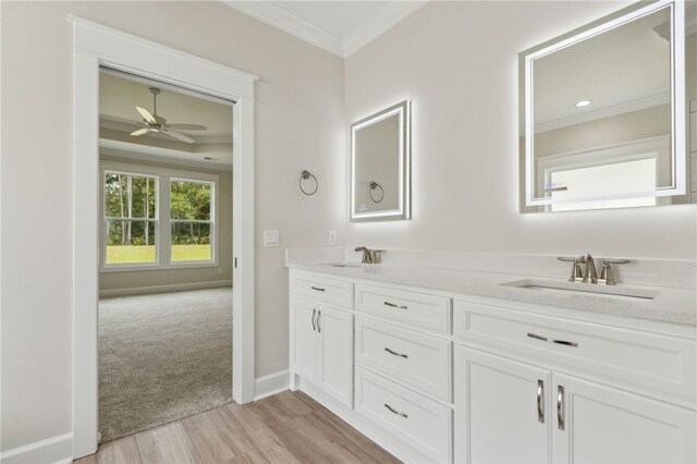 154 Ossabaw Way, Waverly, GA 31565 - full bath with ornamental molding, double vanity, wood finished floors, and a ceiling fan