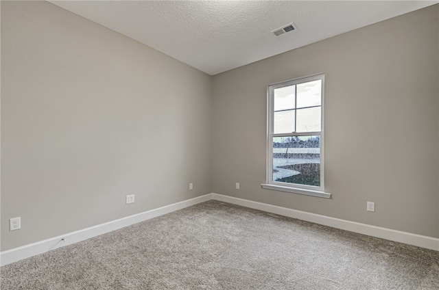 154 Ossabaw Way, Waverly, GA 31565 - empty room with carpet, a textured ceiling, and baseboards