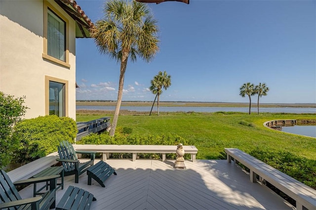 1212 River Club Dr, Sea Island, GA 31561 - wooden terrace featuring a water view and a lawn