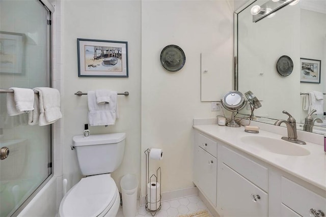 1212 River Club Dr, Sea Island, GA 31561 - full bathroom with vanity, tile patterned flooring, and shower / bath combination with glass door