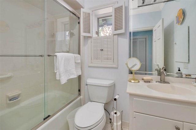 1212 River Club Dr, Sea Island, GA 31561 - bathroom featuring bath / shower combo with glass door and vanity