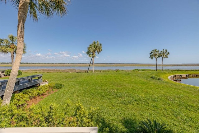 1212 River Club Dr, Sea Island, GA 31561 - view of green lawn with a water view