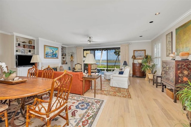 1212 River Club Dr, Sea Island, GA 31561 - dining space with plenty of natural light, light wood finished floors, crown molding, built in features, and a ceiling fan