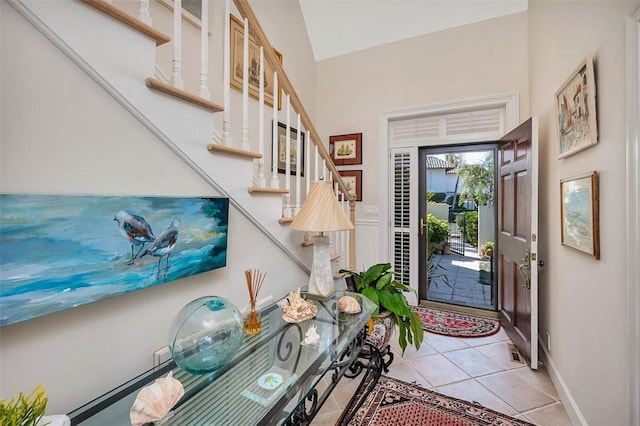 1212 River Club Dr, Sea Island, GA 31561 - foyer entrance with light tile patterned floors and baseboards