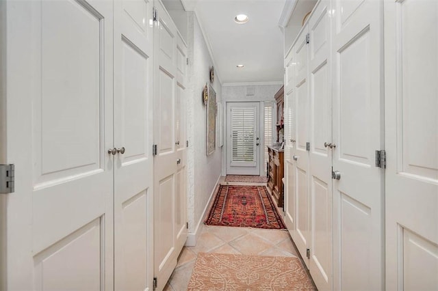 1212 River Club Dr, Sea Island, GA 31561 - corridor with ornamental molding, light tile patterned floors, and recessed lighting