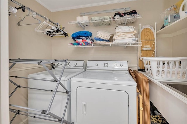 1212 River Club Dr, Sea Island, GA 31561 - washroom with washer and clothes dryer and ornamental molding