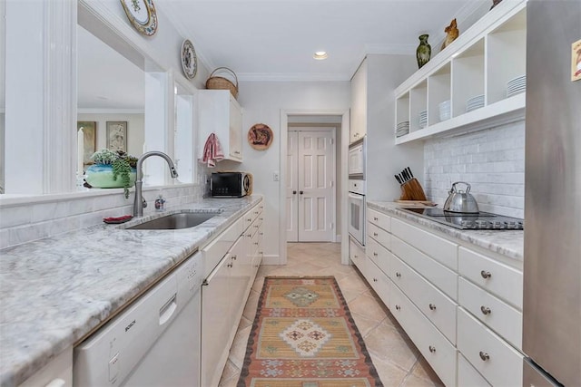 1212 River Club Dr, Sea Island, GA 31561 - kitchen featuring open shelves, white appliances, ornamental molding, tasteful backsplash, and white cabinetry