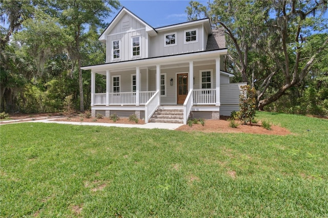 view of front of home featuring a porch and a front lawn