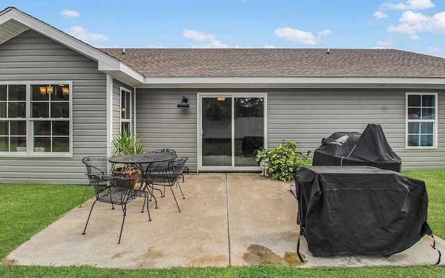 352 Pecan Pointe Dr, Brunswick, GA 31525 - view of patio / terrace with a grill and outdoor dining area