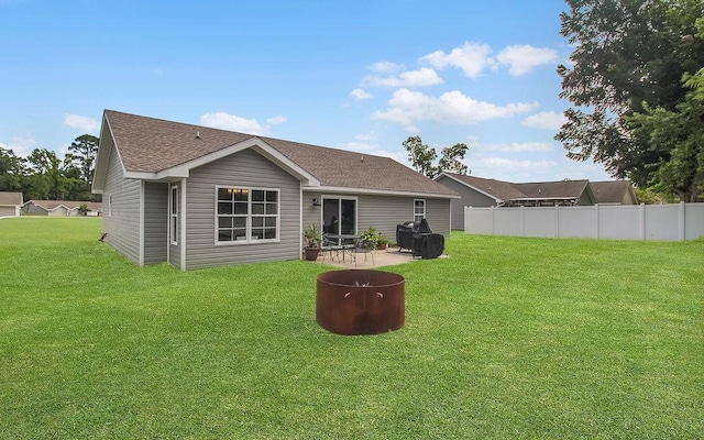 352 Pecan Pointe Dr, Brunswick, GA 31525 - back of property featuring a patio and roof with shingles