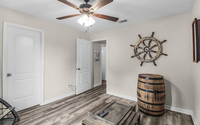 352 Pecan Pointe Dr, Brunswick, GA 31525 - bedroom with wood finished floors and ceiling fan