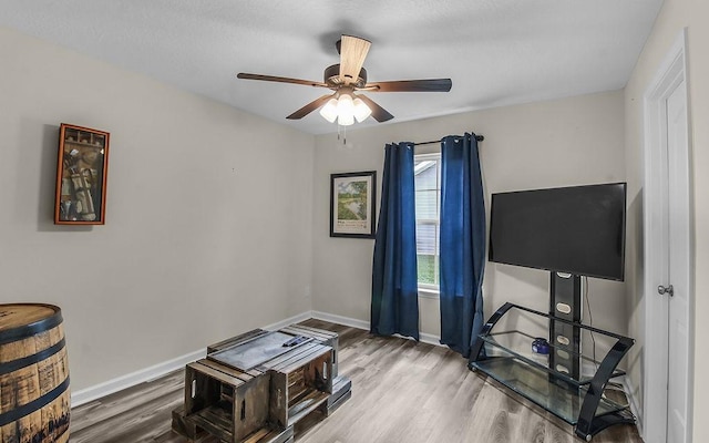 352 Pecan Pointe Dr, Brunswick, GA 31525 - sitting room featuring wood finished floors and ceiling fan