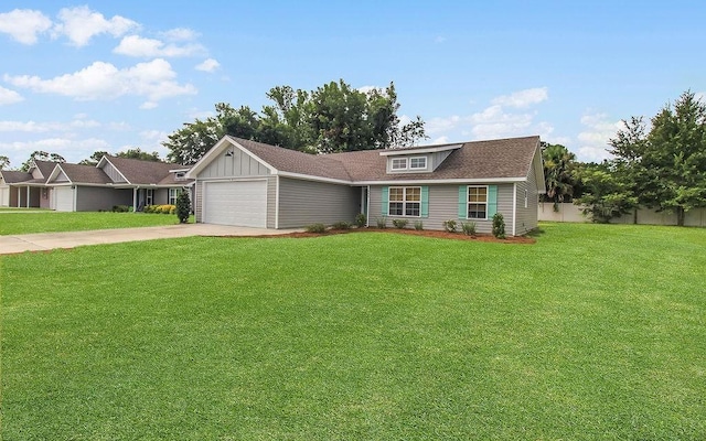 352 Pecan Pointe Dr, Brunswick, GA 31525 - single story home with an attached garage, driveway, and board and batten siding