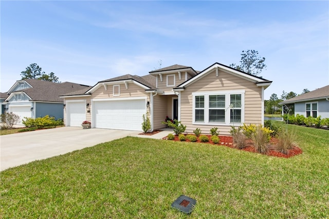 316 Chinquapin Dr, Saint Marys, GA 31558 - view of front facade with a garage, a front lawn, and concrete driveway