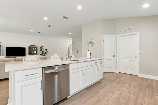 316 Chinquapin Dr, Saint Marys, GA 31558 - kitchen with dishwasher, open floor plan, a sink, light wood-style flooring, and light countertops