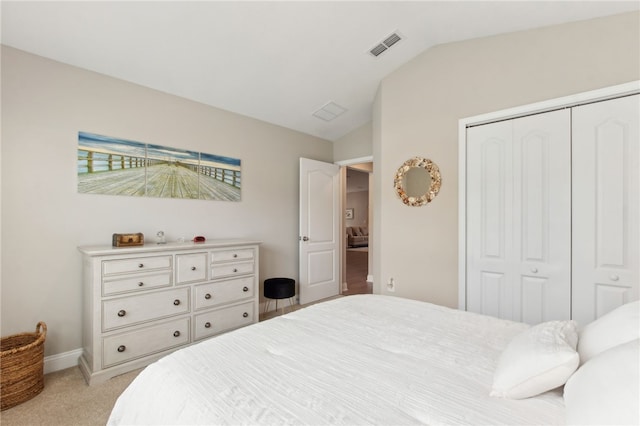 316 Chinquapin Dr, Saint Marys, GA 31558 - bedroom with vaulted ceiling, light colored carpet, a closet, and baseboards