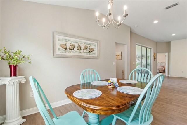 316 Chinquapin Dr, Saint Marys, GA 31558 - dining area featuring baseboards, wood finished floors, a chandelier, and recessed lighting