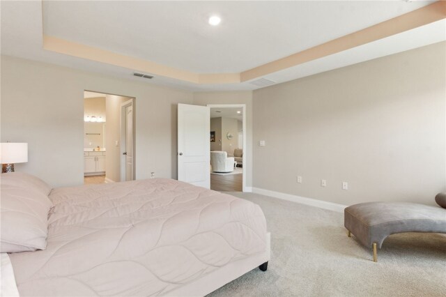 316 Chinquapin Dr, Saint Marys, GA 31558 - bedroom featuring light colored carpet, connected bathroom, baseboards, and recessed lighting