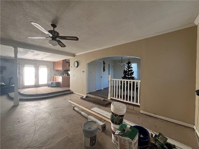 view of patio / terrace featuring ceiling fan and french doors