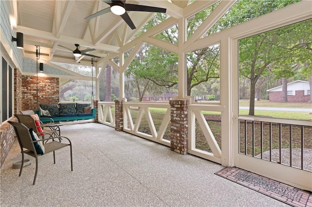 636 Old Plantation Rd, Jekyll Island, GA 31527 - unfurnished sunroom featuring a ceiling fan