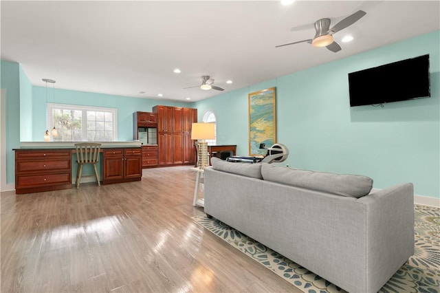 636 Old Plantation Rd, Jekyll Island, GA 31527 - living area with a ceiling fan, a desk, light wood-style floors, recessed lighting, and baseboards