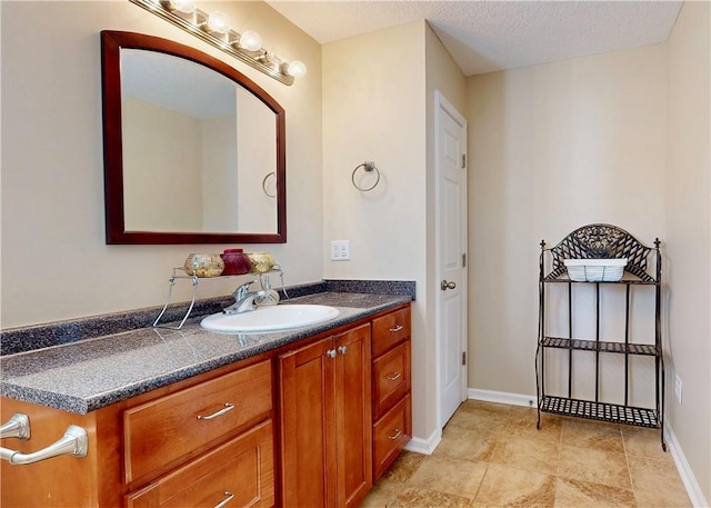 2300 Albany Ave, Waycross, GA 31503 - bathroom with vanity and baseboards