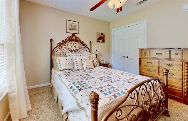 2300 Albany Ave, Waycross, GA 31503 - bedroom with carpet, a closet, ceiling fan, and baseboards