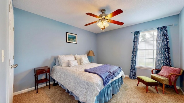 2300 Albany Ave, Waycross, GA 31503 - bedroom featuring light colored carpet, baseboards, and a ceiling fan