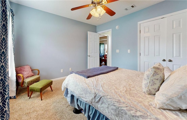 2300 Albany Ave, Waycross, GA 31503 - carpeted bedroom featuring a closet, ceiling fan, and baseboards