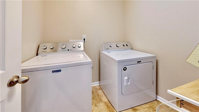 2300 Albany Ave, Waycross, GA 31503 - laundry area with independent washer and dryer and baseboards