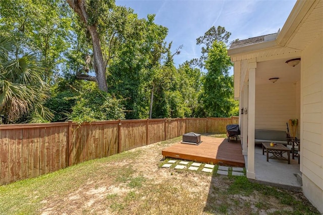 63 Greyfield Dr, Brunswick, GA 31525 - fenced backyard featuring a wooden deck