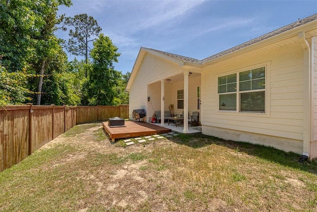 63 Greyfield Dr, Brunswick, GA 31525 - view of yard featuring a wooden deck and a patio area