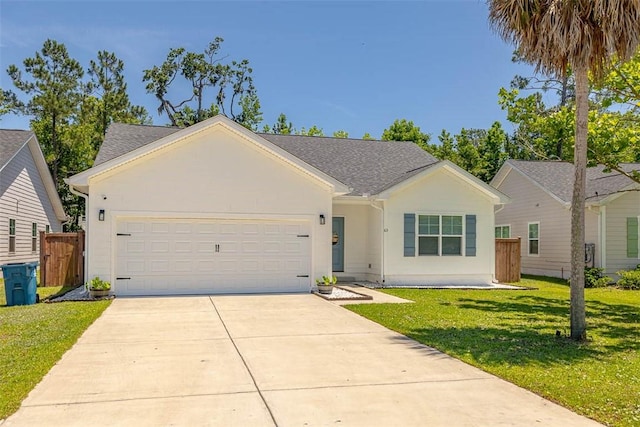 63 Greyfield Dr, Brunswick, GA 31525 - ranch-style house with driveway and an attached garage