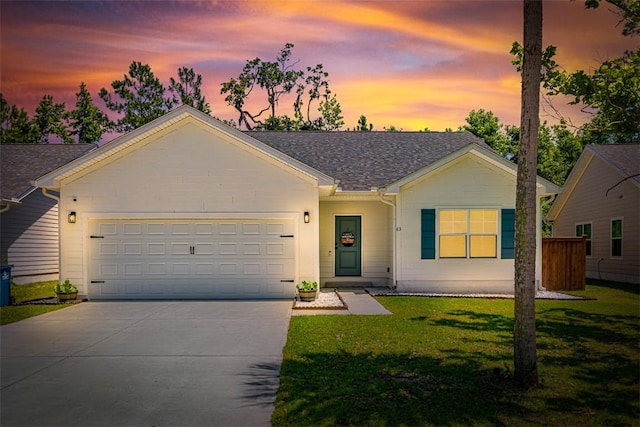 63 Greyfield Dr, Brunswick, GA 31525 - ranch-style house with a garage, driveway, and a yard