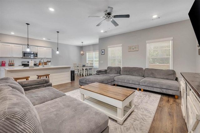 63 Greyfield Dr, Brunswick, GA 31525 - living room with wood finished floors, recessed lighting, and a ceiling fan