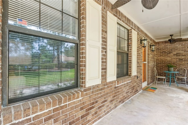 70 Buntin St, Woodbine, GA 31569 - covered porch featuring ceiling fan