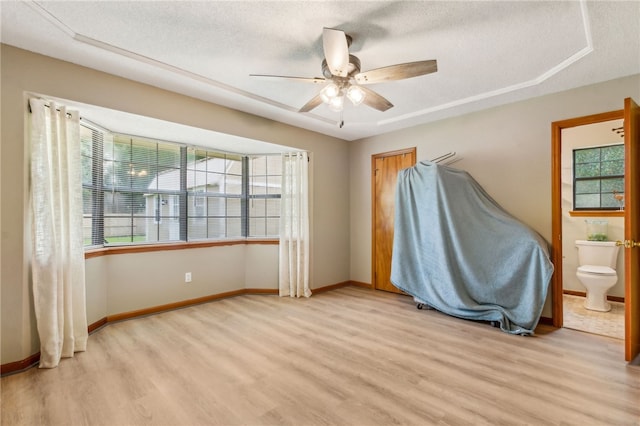 70 Buntin St, Woodbine, GA 31569 - empty room featuring wood finished floors, a textured ceiling, and ceiling fan
