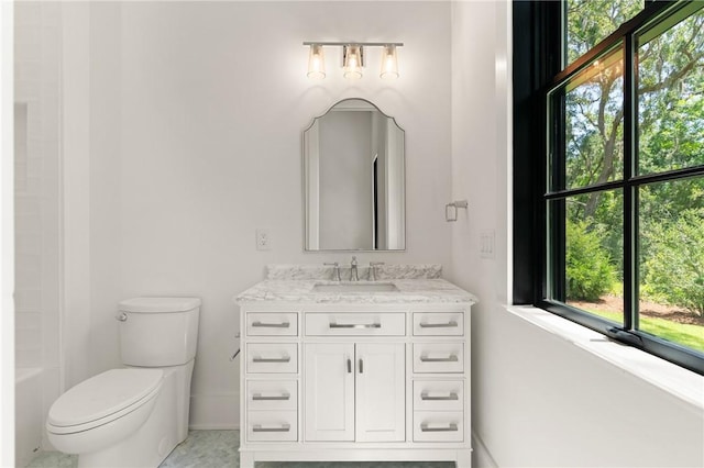 104 Point Ln, Saint Simons Island, GA 31522 - bathroom with vanity and plenty of natural light