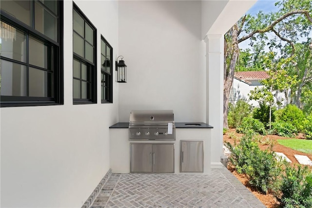 104 Point Ln, Saint Simons Island, GA 31522 - view of patio with area for grilling