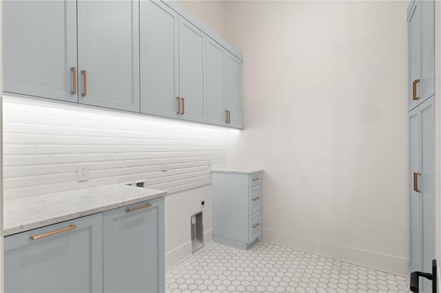 104 Point Ln, Saint Simons Island, GA 31522 - laundry room featuring cabinet space and electric dryer hookup