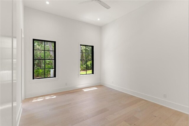 104 Point Ln, Saint Simons Island, GA 31522 - unfurnished room featuring light wood-style flooring, a ceiling fan, and recessed lighting