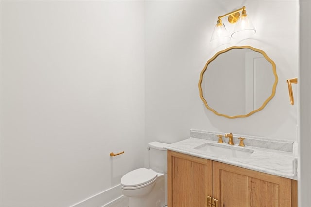 104 Point Ln, Saint Simons Island, GA 31522 - half bathroom with vanity and toilet