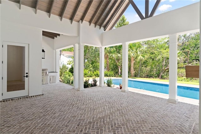 104 Point Ln, Saint Simons Island, GA 31522 - outdoor pool with an outdoor kitchen and a patio
