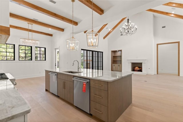 104 Point Ln, Saint Simons Island, GA 31522 - kitchen with dishwasher, a chandelier, beamed ceiling, a large island with sink, and high vaulted ceiling