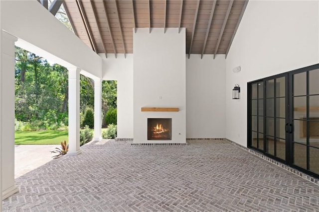 104 Point Ln, Saint Simons Island, GA 31522 - view of patio / terrace with a lit fireplace
