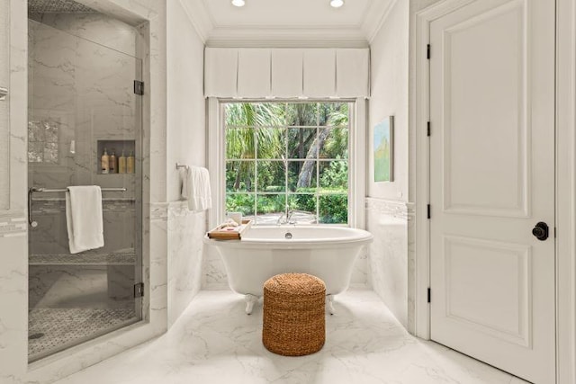 bathroom with separate shower and tub, tile walls, and ornamental molding