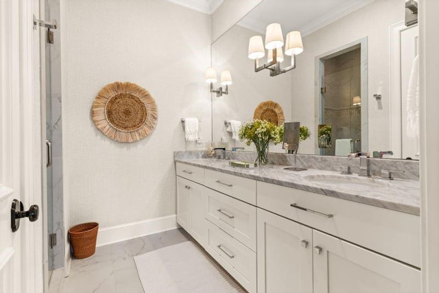 bathroom with vanity, crown molding, and walk in shower