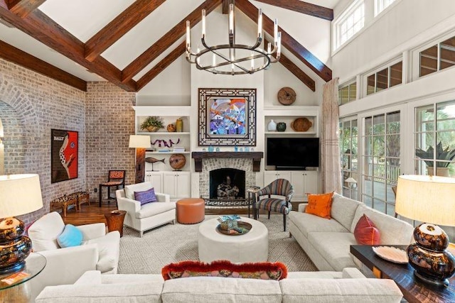 living room with beam ceiling, high vaulted ceiling, and a chandelier